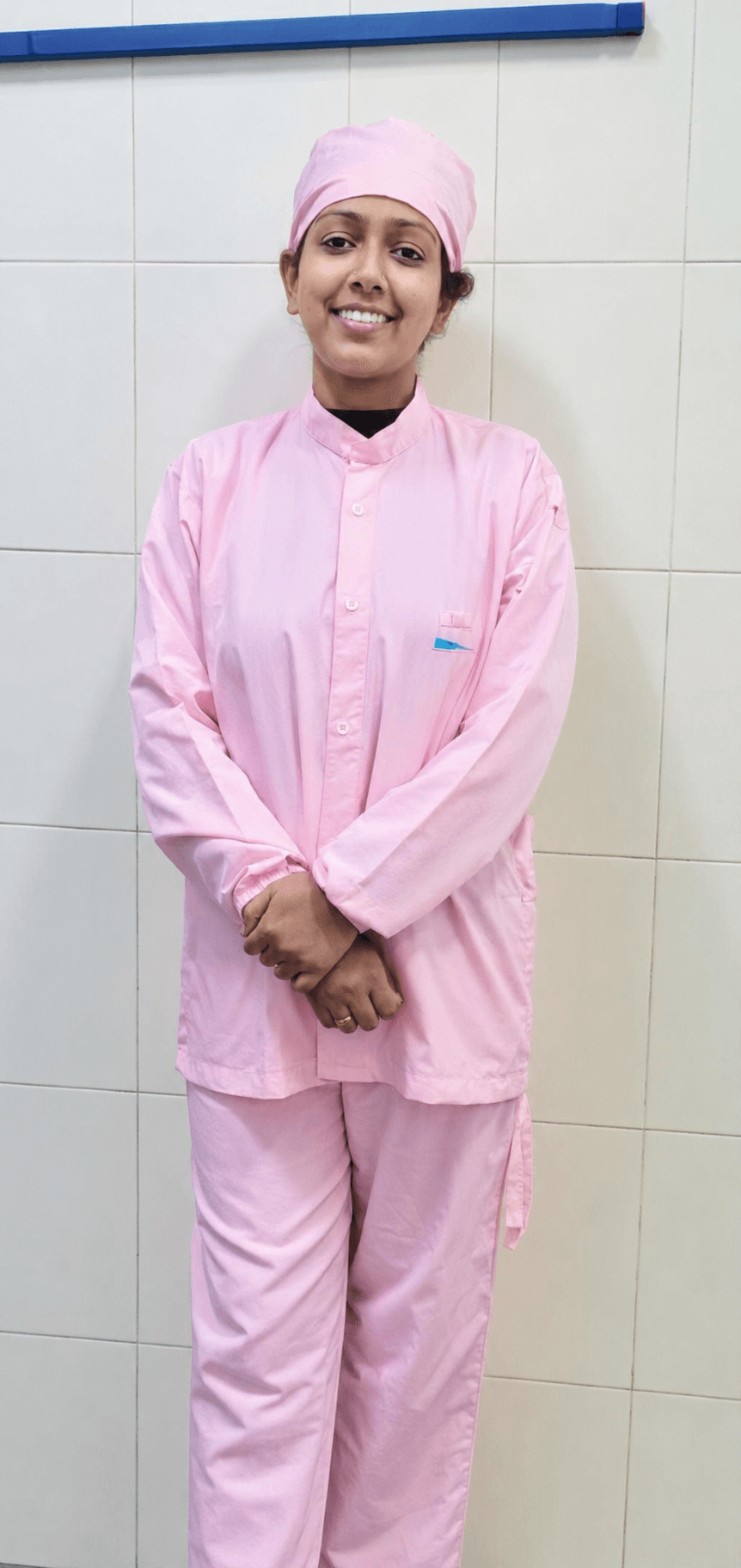 Saumya Dubey in a historical QA cleanroom work setting.